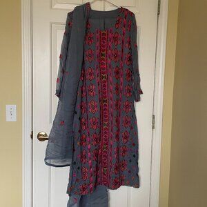 3 piece salwar kameez set in gray with vibrant embroidery